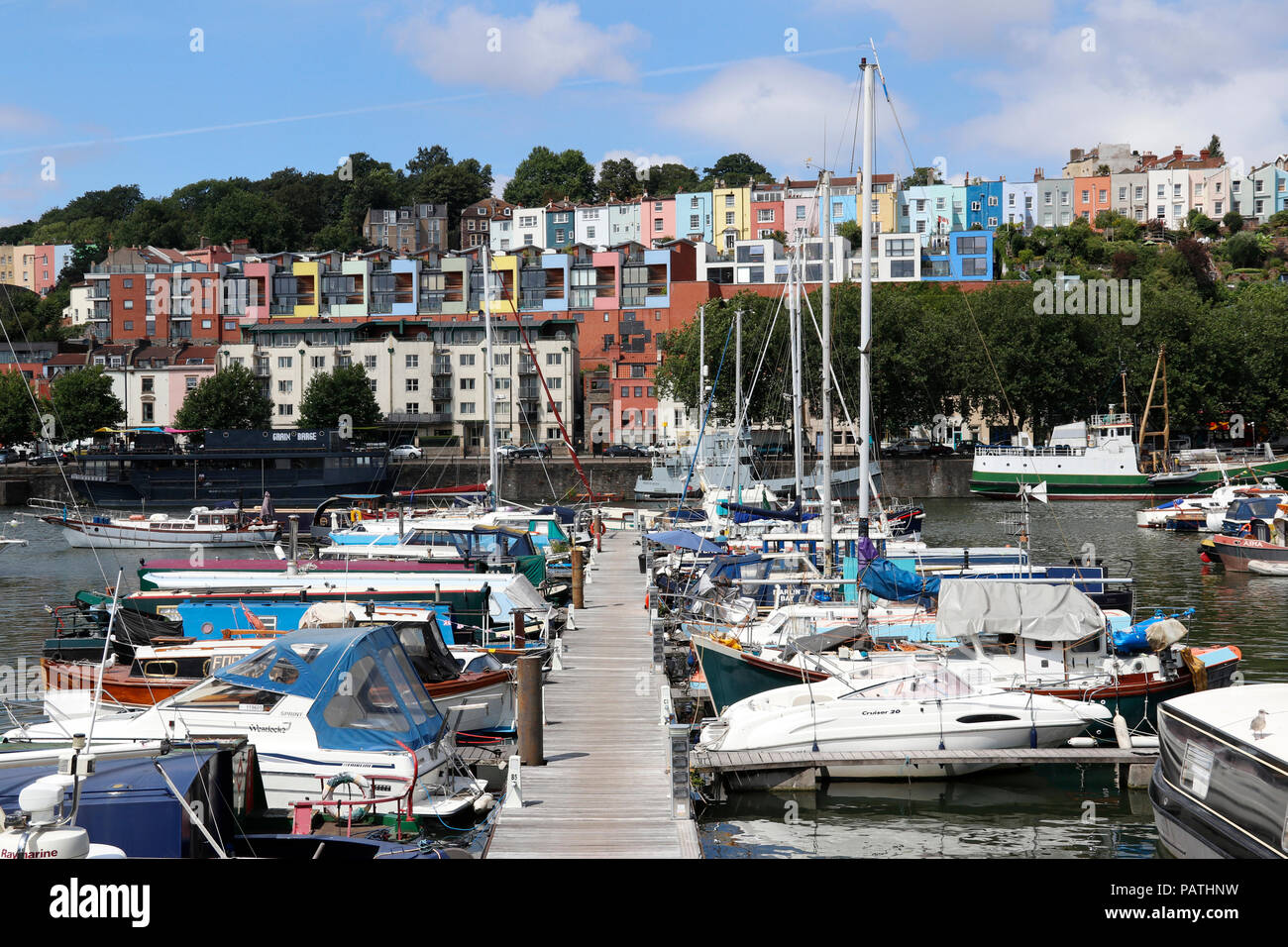 The colourful terraced houses of Cliftonwood as seen from Bristol's Floating Harbour Stock Photo