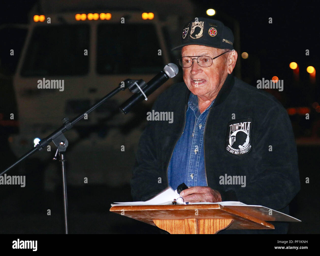 Retired U.S. Army Maj. Arden Rowley, 85-year-old Korean War Veteran and Prisoner of War who served with the 2nd Engineer Combat Battalion during the Korean War battle at Kunu-ri on Nov. 30, 1950 delivers his speech during the Burning of the Colors Ceremony on Bulldog Field Nov. 19, 2015. (U.S. Army Photo by Spc. Von Marie Donato, 3rd ABCT, 1st AD) Stock Photo