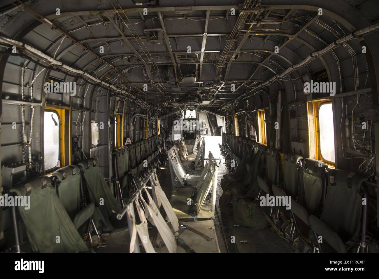 The interior of a CH-53E helicopter which can hold up to 43 passengers at Hilo International Airport, May 27, 2018. HMH-463 execute daily inspections of their aircraft while on standby for a possible evacuation of civilians affected by the Kilauea volcano eruption. Stock Photo