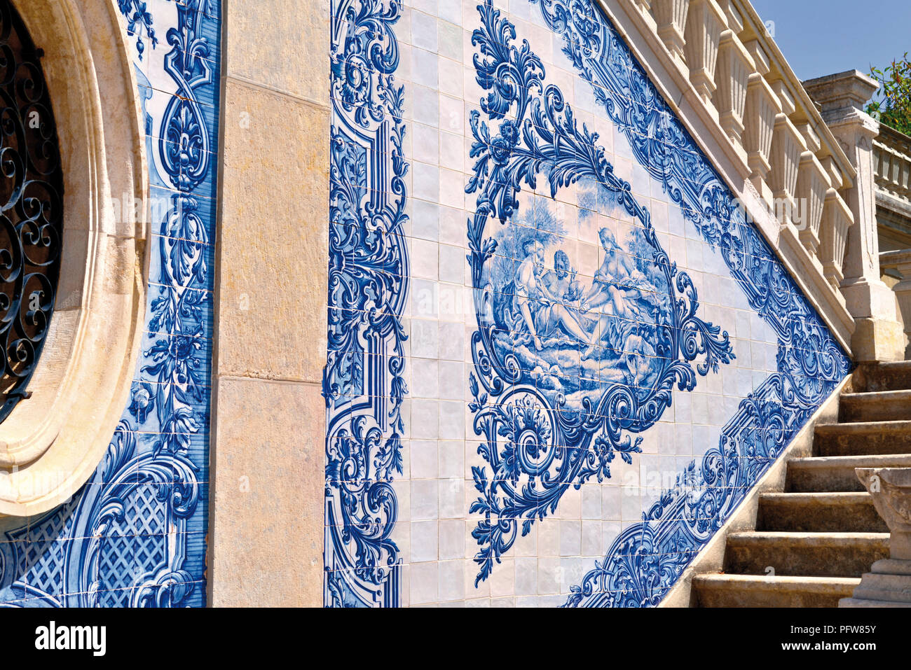 Historic blue and white tiles at an italian inspired outdoor palace staircase Stock Photo