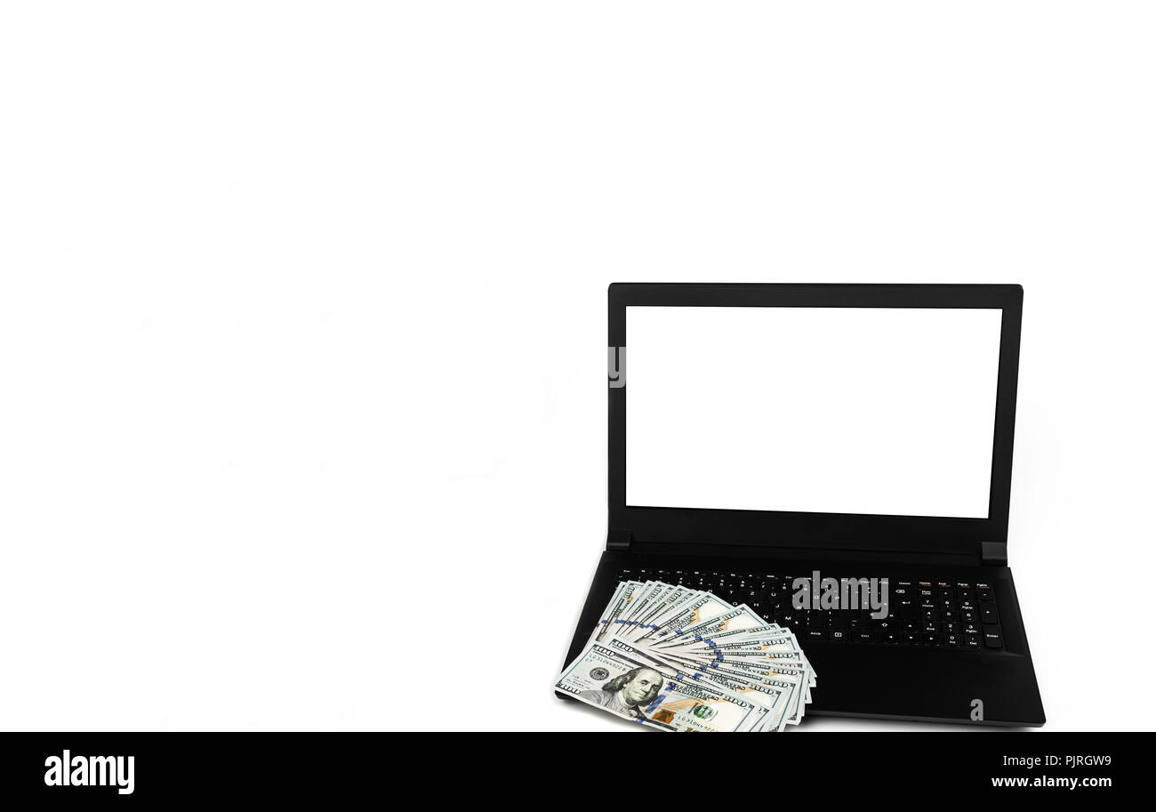 Laptop or notebook with widespread of dollar cash money isolated on white background with clean blank display. Template, mock up. Stock Photo