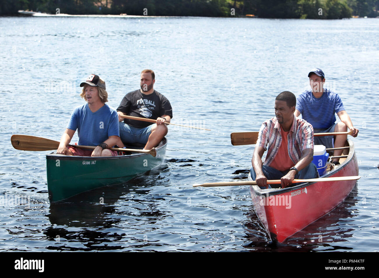 David Spade as 'Marcus Higgins', Kevin James as 'Eric Lamonsoff', Chris Rock as 'Kurt McKenzie' and Adam Sandler as 'Lenny Feder in Columbia Pictures' GROWN UPS. Stock Photo