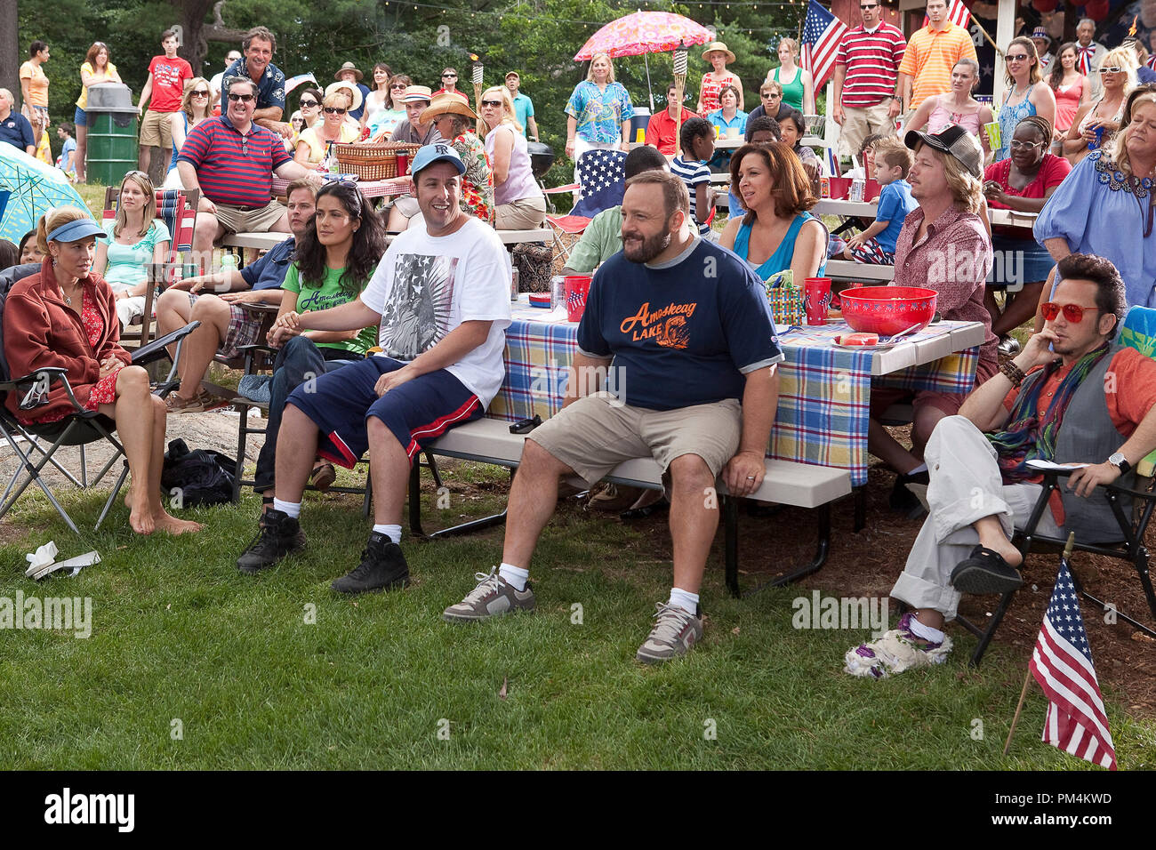 Sally (Maria Bello), Roxanne (Salma Hayek), Lenny (Adam Sandler), Eric (Kevin James), Deanne (Maya Rudolph), Marcus (David Spade), and Rob (Rob Schneider) in Columbia PIctures' GROWN UPS. Stock Photo