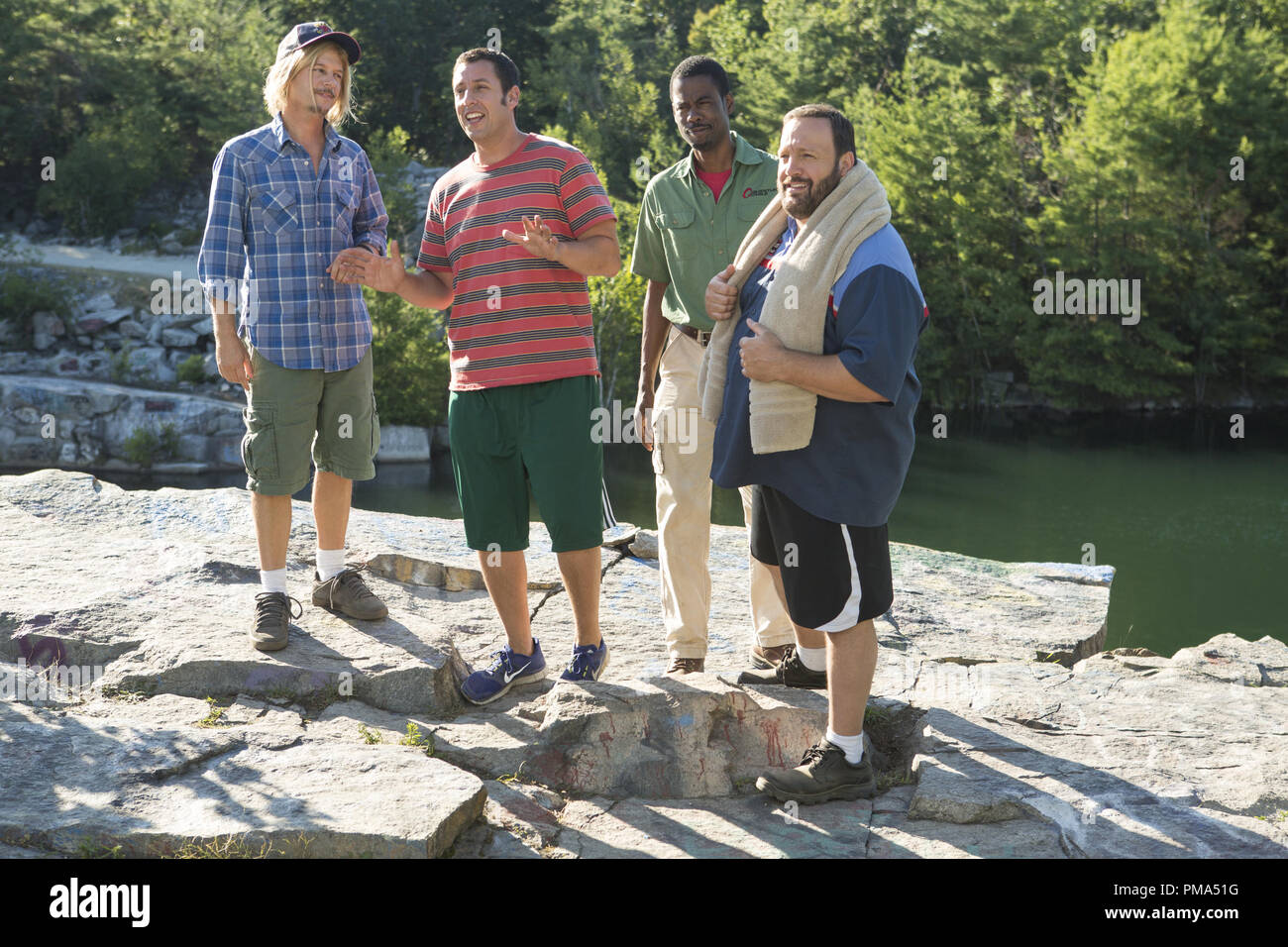 Marcus Higgins (David Spade), Lenny Feder (Adam Sandler), Kurt McKenzi (Chris Rock) and Eric Lamonsoff (Kevin James) at the quarry in Columbia Pictures' GROWN UPS 2. Stock Photo