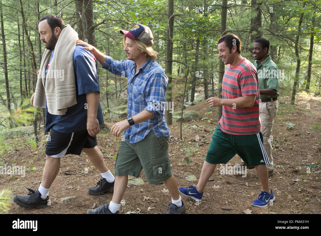 Eric Lamonsoff (Kevin James), Marcus Higgins (David Spade), Lenny Feder (Adam Sandler) and Kurt McKenzie (Chris Rock) going to the quarry in Columbia Pictures' GROWN UPS 2. Stock Photo