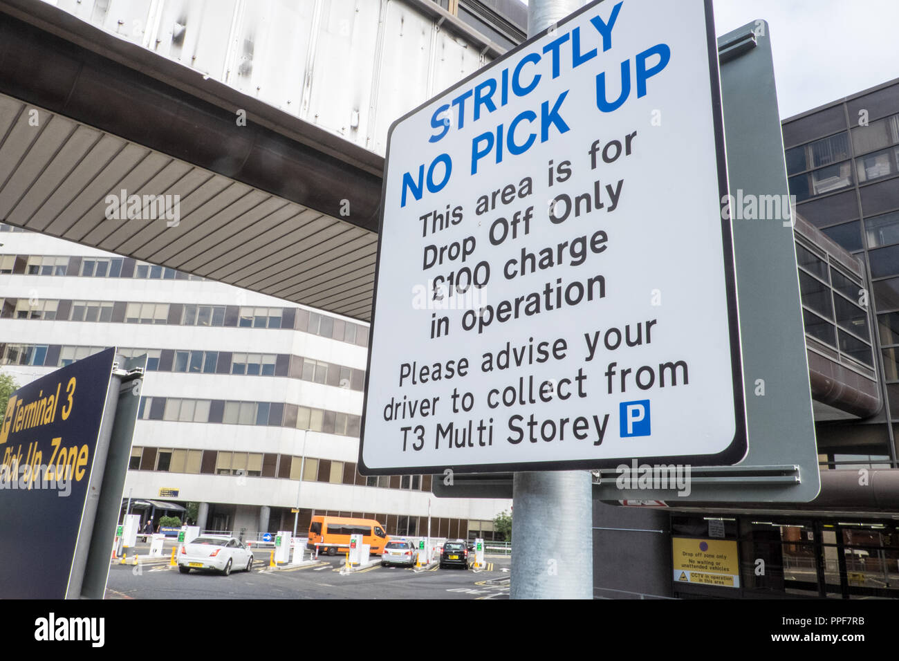 car,parking,no,pick up,outside,terminal,building,safety,issue,drop off,only,Manchester Airport,transport,transportation,hub,England,UK,U.K.,Europe. Stock Photo