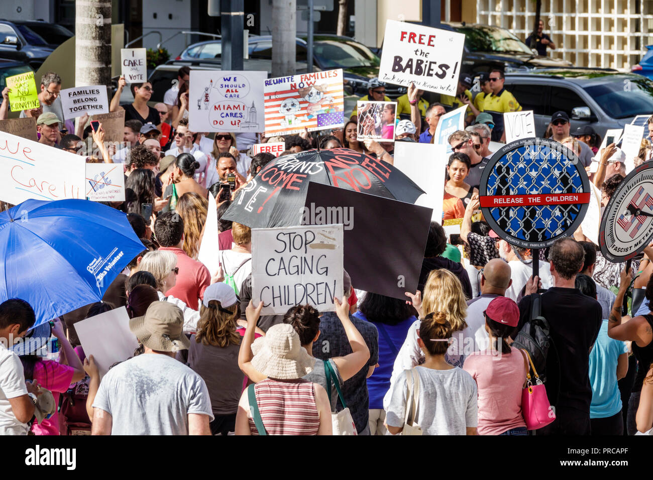 Miami Florida,demonstration demonstrating protest protesting,Families Belong Together Free Children illegal immigration,Mexican border family separati Stock Photo