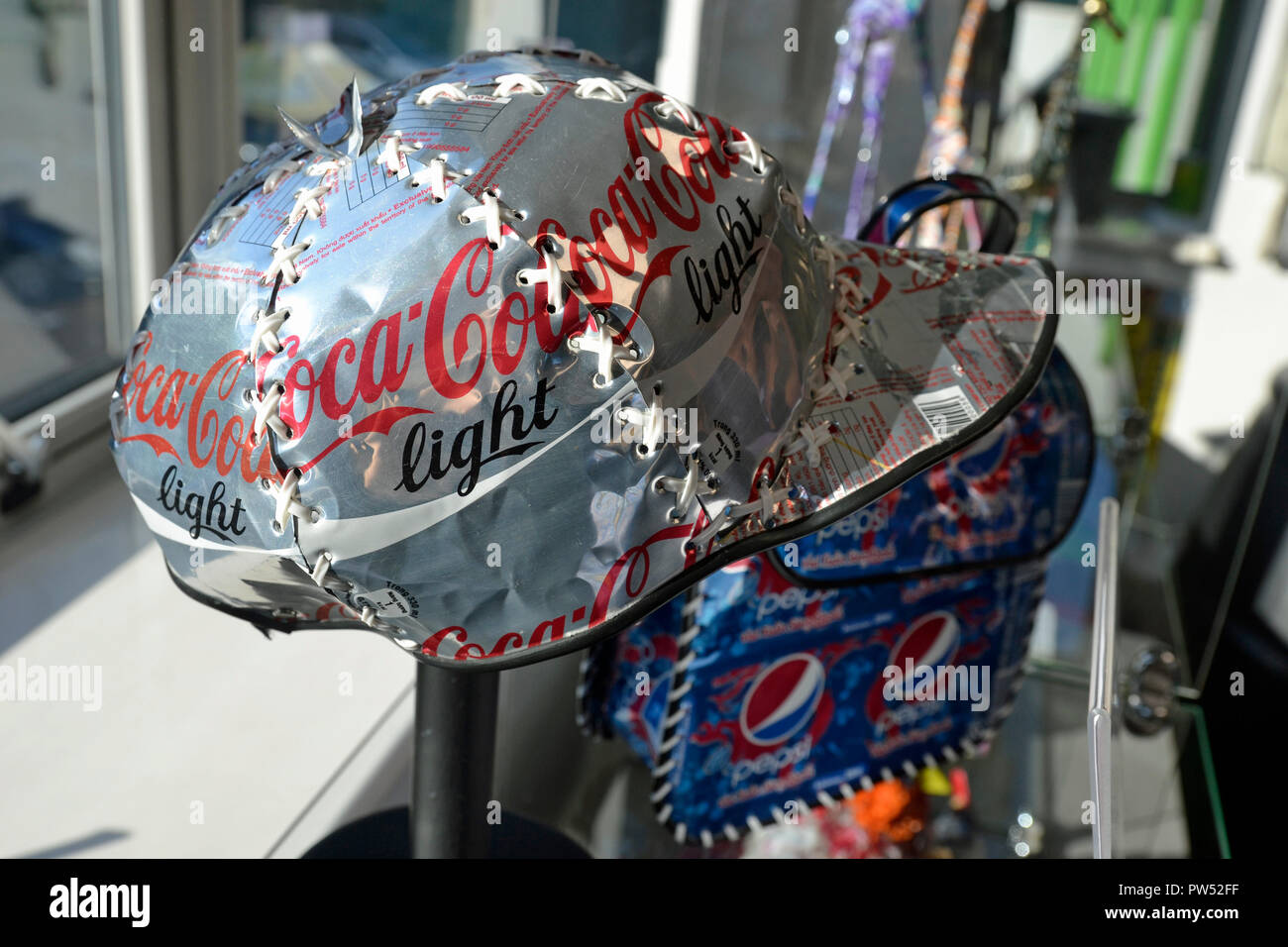 Cap made from cola cans in Africa. On display in the visitor centre at Milton Keynes Waste Recovery Park, Recycling Factory, Buckinghamshire, Stock Photo