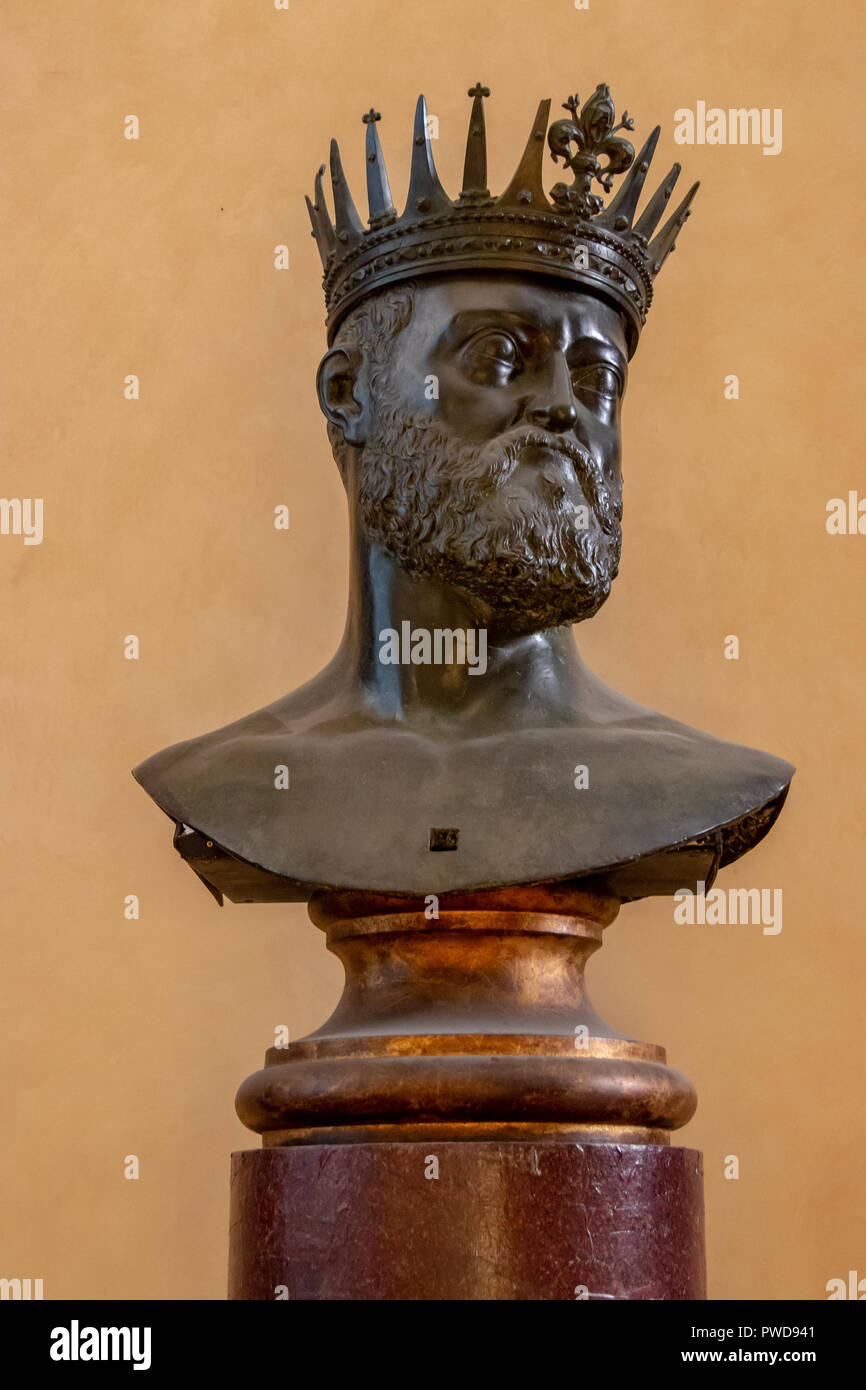 A bust of a man wearing a crown with the Florentine fleur de lis prominent at the top on display in the Pitti Palace in Florence, Italy. Stock Photo