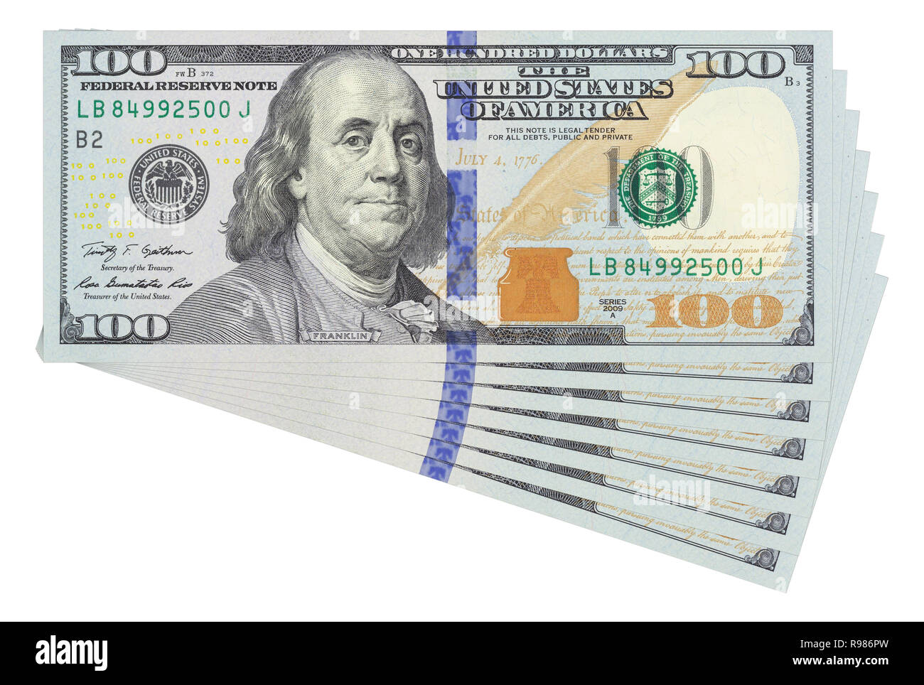 100 dollar bills on white background isolated. Business money concept template. Stock Photo