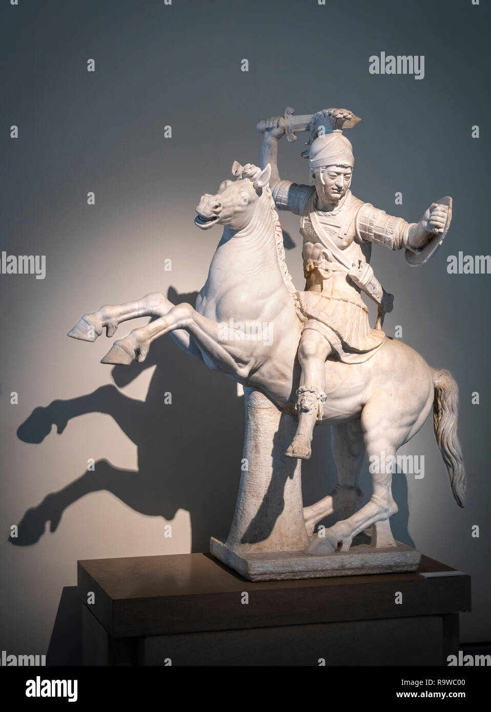 A marble sculpture of a Warrior on horseback. A 2nd cen. AD Roman copy of a 2nd cen BC Greek sculpture. In the National Archaeological Museum at Naple Stock Photo