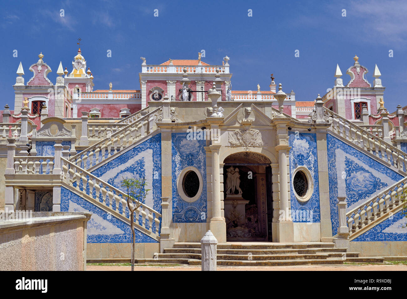 Italian stylie palace and outside staircase with blue and white tiles Stock Photo