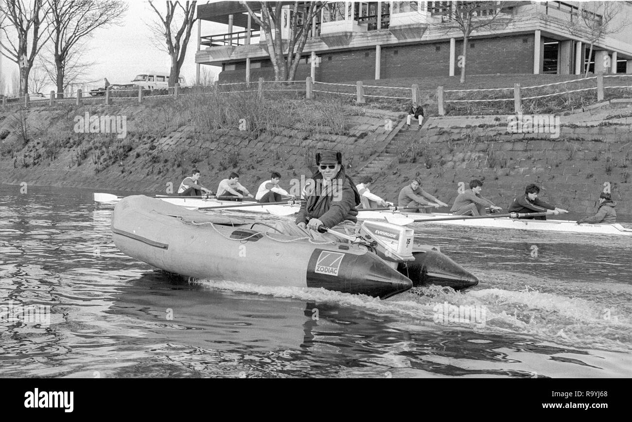 London. United Kingdom.  Mike SPRACKLEN, coaching from a 'Rib' passing Thames Tradsman RC, Barnes Bridge, 1987 Pre Fixture, Varsity Boat Race. National Squad vs Cambridge University BC on the Championship Course Mortlake to Putney. River Thames.  Saturday 21.03.1987  [Mandatory Credit: Peter SPURRIER/Intersport images]  National Squad, Bow, Terry Dillon, John MAXEY, John GARRETT, Martin CROSS, Andy HOLMES, Steve REDGRAVE, Adam CLIFT, Richard STANHOPE and Cox, Pat SWEENEY Stock Photo