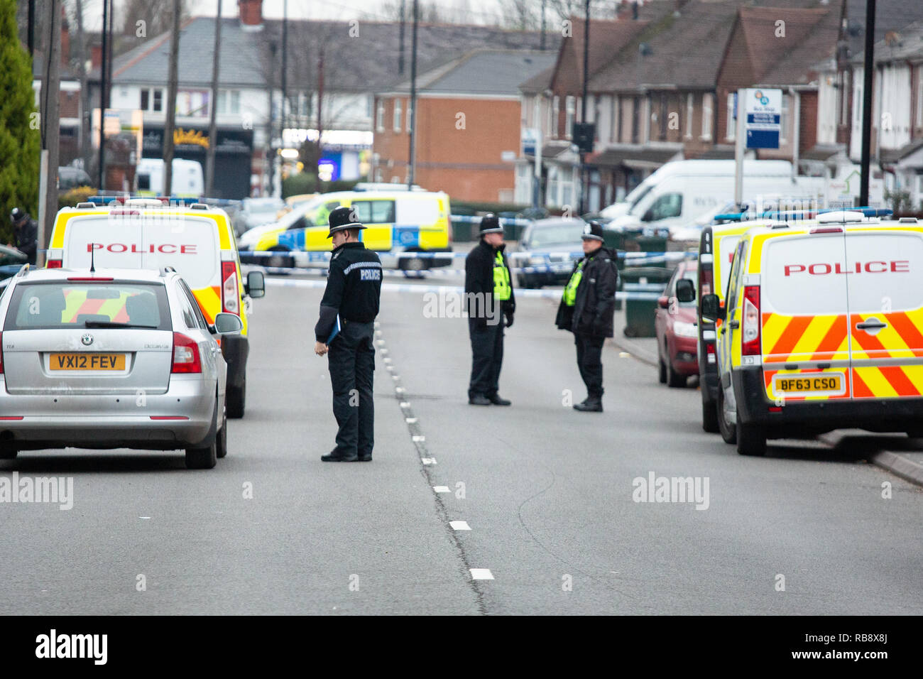 Police pictured in Burnaby Road, Coventry shortly after Police shot dead Sean Fitzgerald at a property in the street. Stock Photo