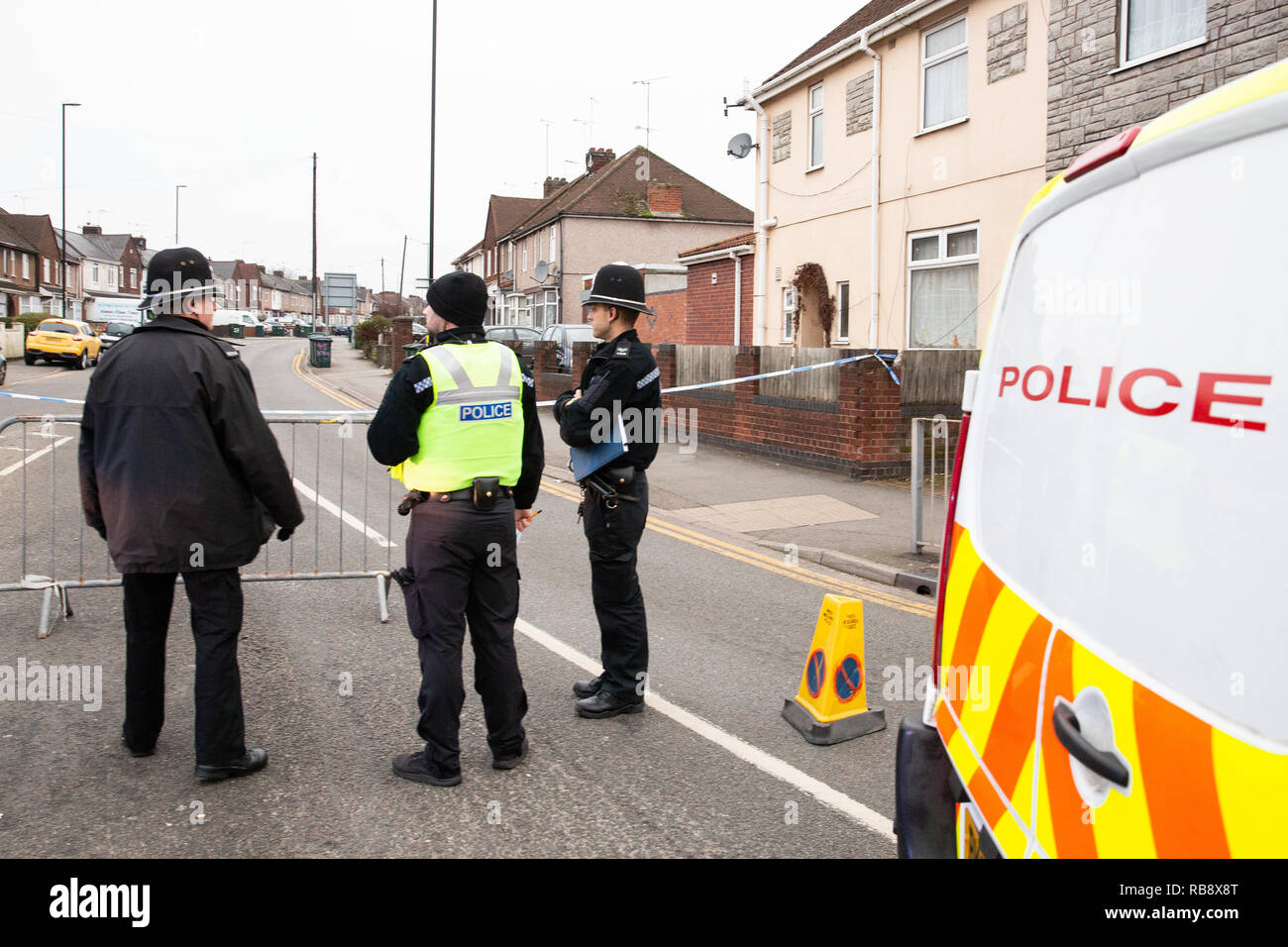 Police pictured in Burnaby Road, Coventry shortly after Police shot dead Sean Fitzgerald at a property in the street. Stock Photo