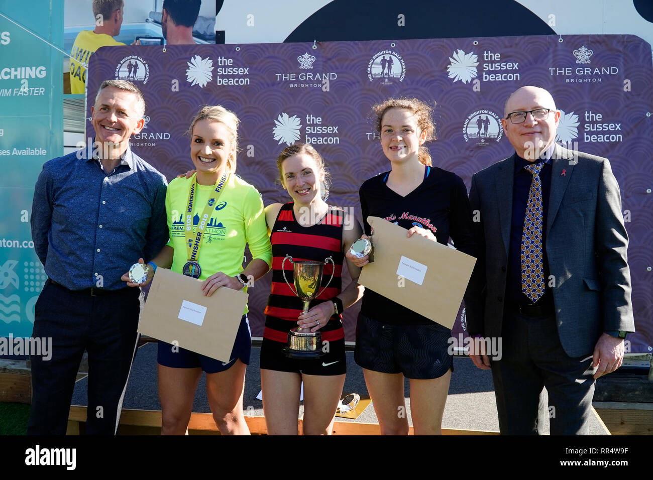 Brighton, Sussex, UK. 24th Feb 2019.   Brighton Half Marathon 2019  First Three Women ... Fiona de Mauny ,Emily Proto and  Rose Penfold. Credit: Caron Watson/Alamy Live News Stock Photo