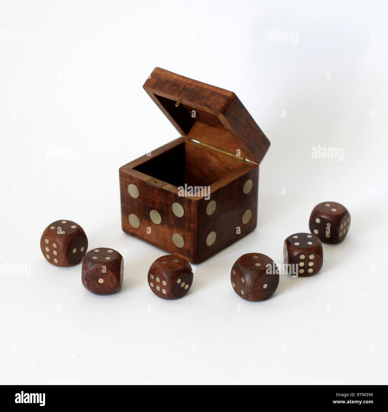 Vintage wooden cube with dice for board games Stock Photo