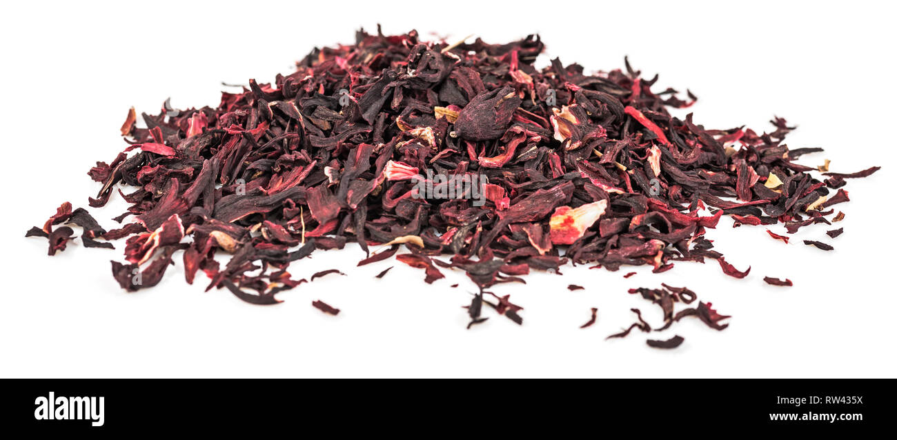 Heap of dried hibiscus petals isolated on white background. Red tea, karkade. Stock Photo