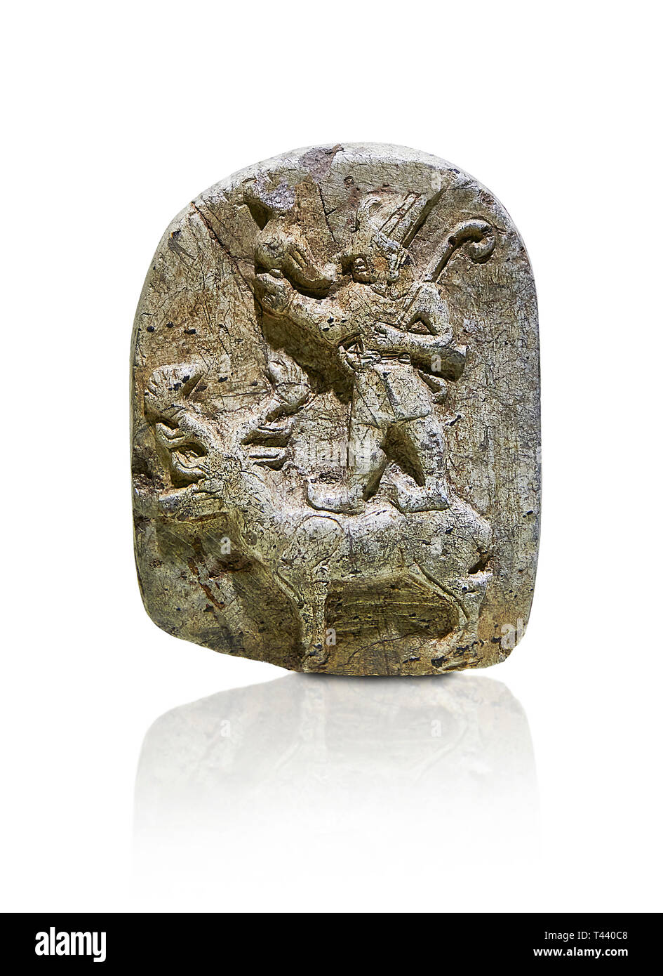 Plaque depicting the Hittite Protector of the wild standing on the back of a deer. Steatite - 14th - 13th century BC - Corum Yenikoy  - Museum of Anat Stock Photo