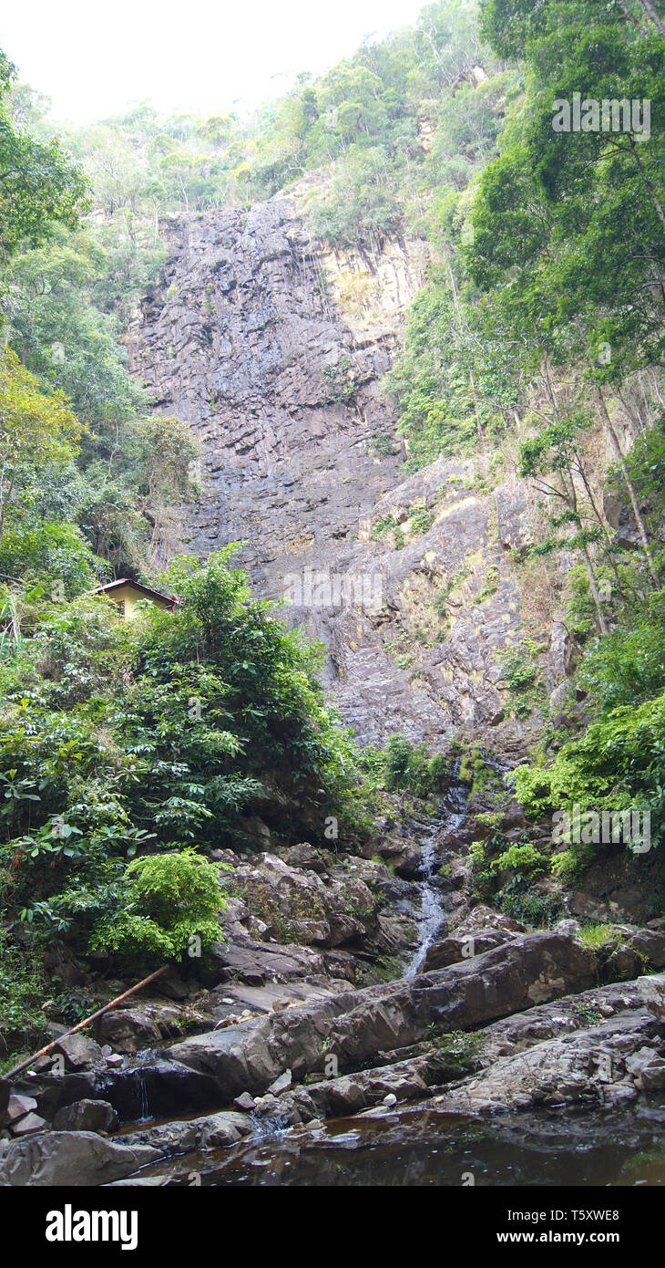 KEDAH, LANGKAWI, MALAYSIA - APR 10th, 2015: The Temurun Waterfall - Forest park featuring a 3-tier waterfall with both shallow deep pools, plus Stock Photo