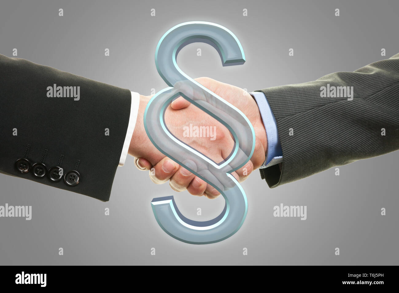 Two lawyers shaking hands - paragraph symbol Stock Photo