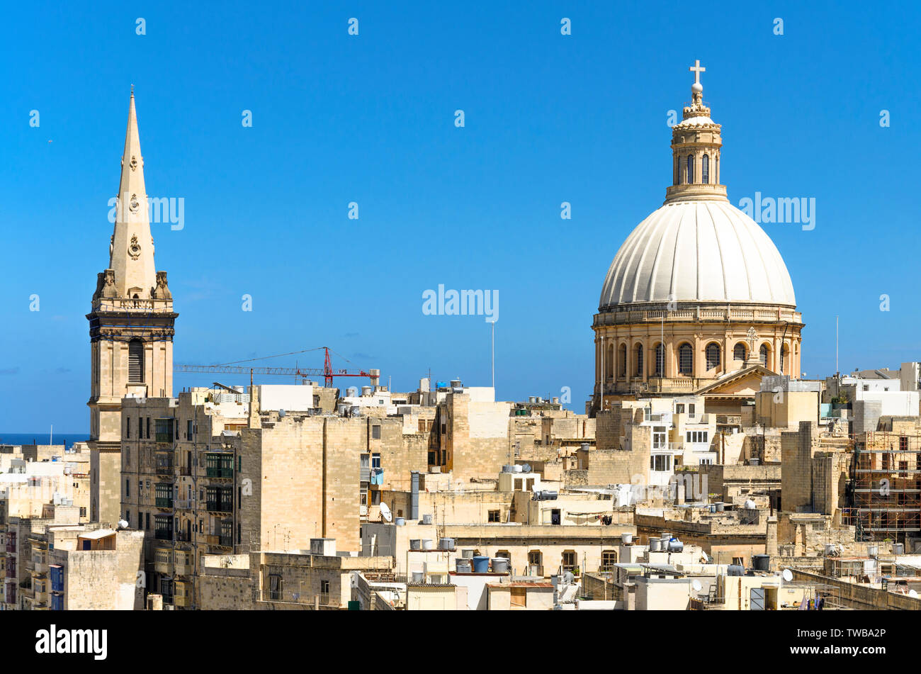 The view from above on Valletta's old town roofs with Saint Paul Pro-Cathedral dome Stock Photo