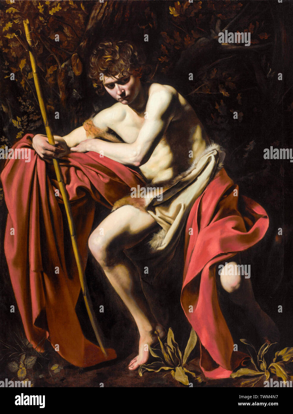 Caravaggio, Saint John the Baptist in the Wilderness, painting, circa 1604 Stock Photo