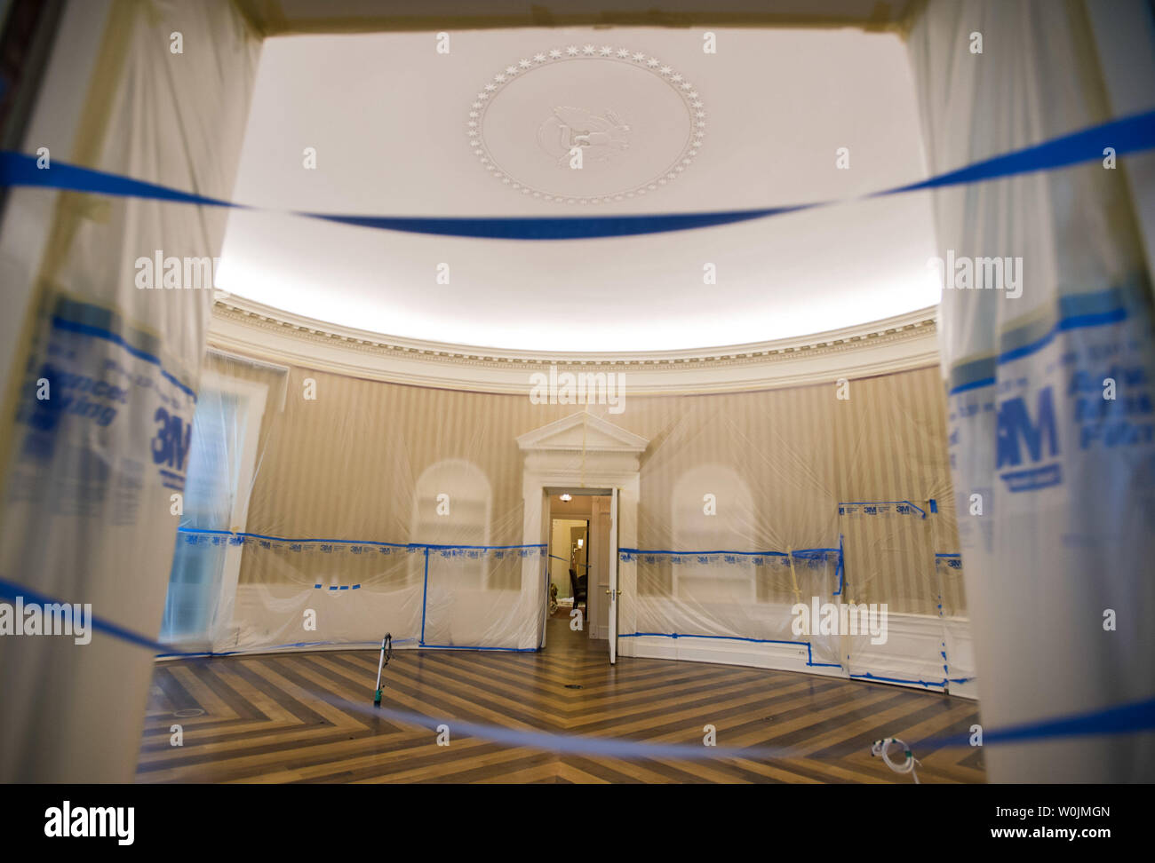 The Oval Office is seen emptied and covered in plastic as renovations are underway at the White House, in Washington, D.C. on August 11, 2017. While President Trump is in New Jersey on a 17-day vacation workers are updating and repairing the West Wing, including structural repairs, IT and HVAC improvements and generic cosmetic upgrades. Photo by Kevin Dietsch/UPI Stock Photo