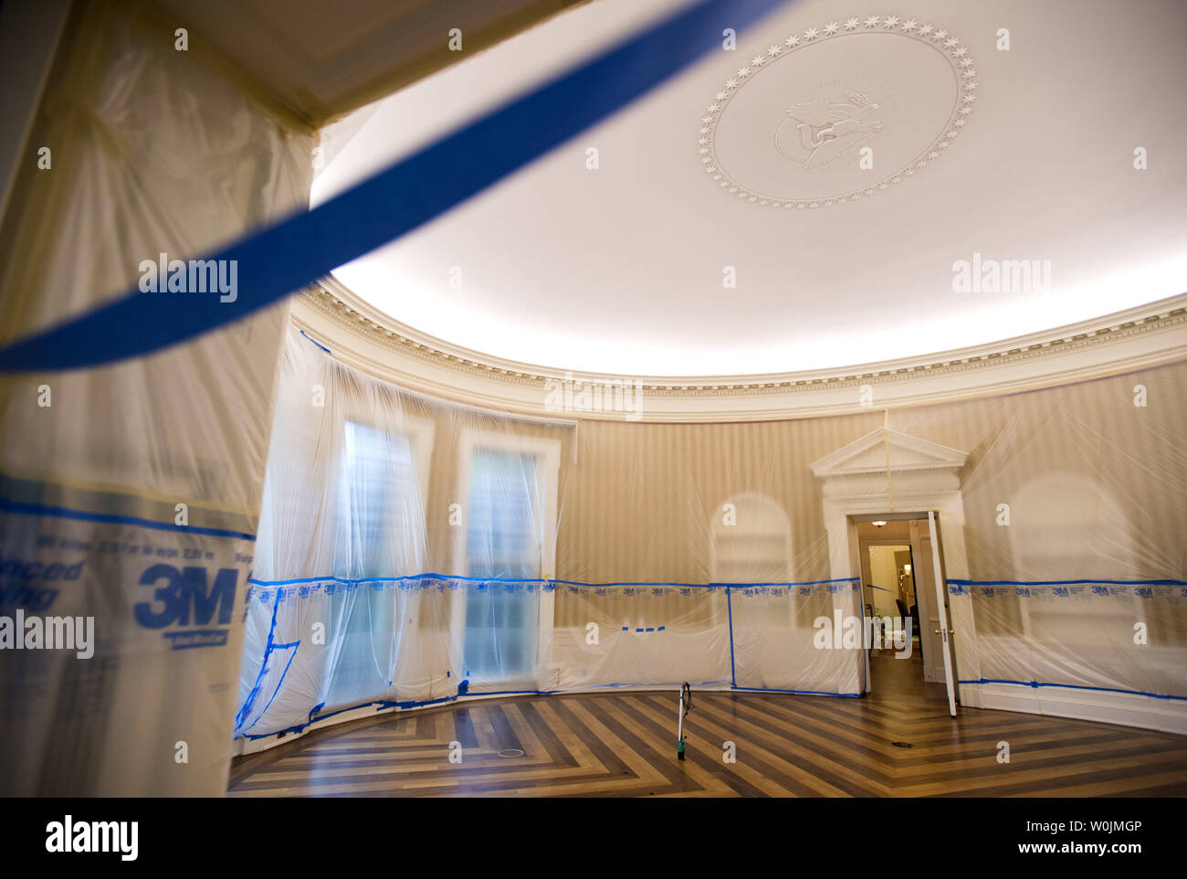 The Oval Office is seen emptied and covered in plastic as renovations are underway at the White House, in Washington, D.C. on August 11, 2017. While President Trump is in New Jersey on a 17-day vacation workers are updating and repairing the West Wing, including structural repairs, IT and HVAC improvements and generic cosmetic upgrades. Photo by Kevin Dietsch/UPI Stock Photo