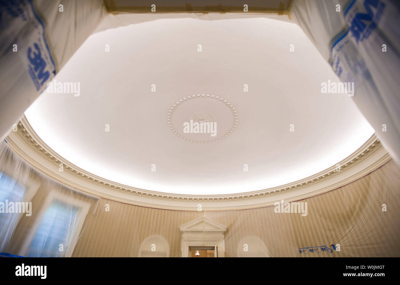 The Oval Office is seen emptied and covered in plastic as renovations are underway at the White House, in Washington, D.C. on August 11, 2017. While President Trump is in New Jersey on a 17-day vacation workers are updating and repairing the West Wing, including structural repairs, IT and HVAC improvements and generic cosmetic upgrades. Photo by Kevin Dietsch/UPI Stock Photo