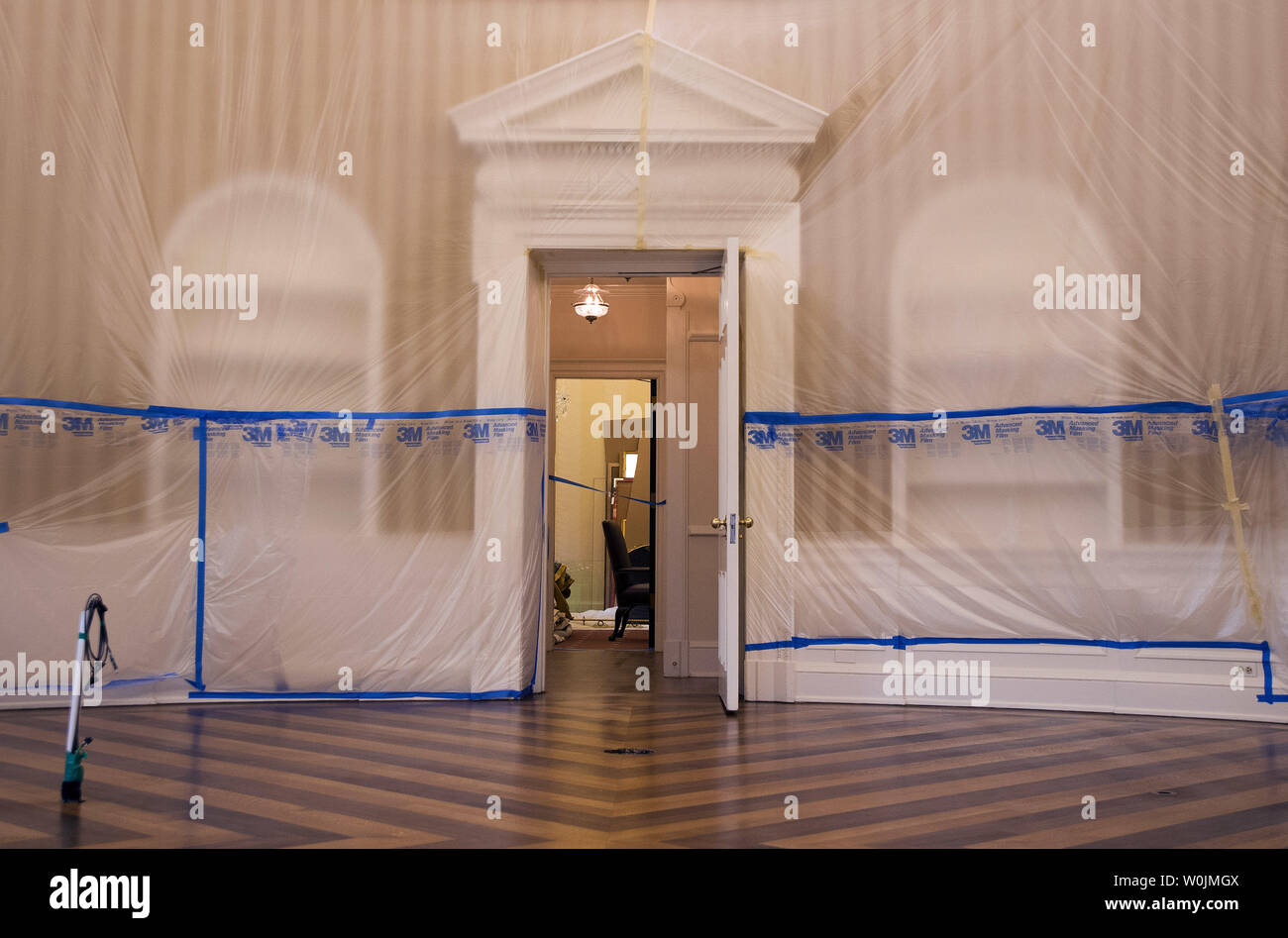 The Oval Office is seen emptied and covered in plastic as renovations are underway at the White House, in Washington, D.C. on August 11, 2017. While President Trump is in New Jersey on a 17-day vacation workers are updating and repairing the West Wing, including structural repairs, IT and HVAC improvements and generic cosmetic upgrades. Photo by Kevin Dietsch/UPI Stock Photo