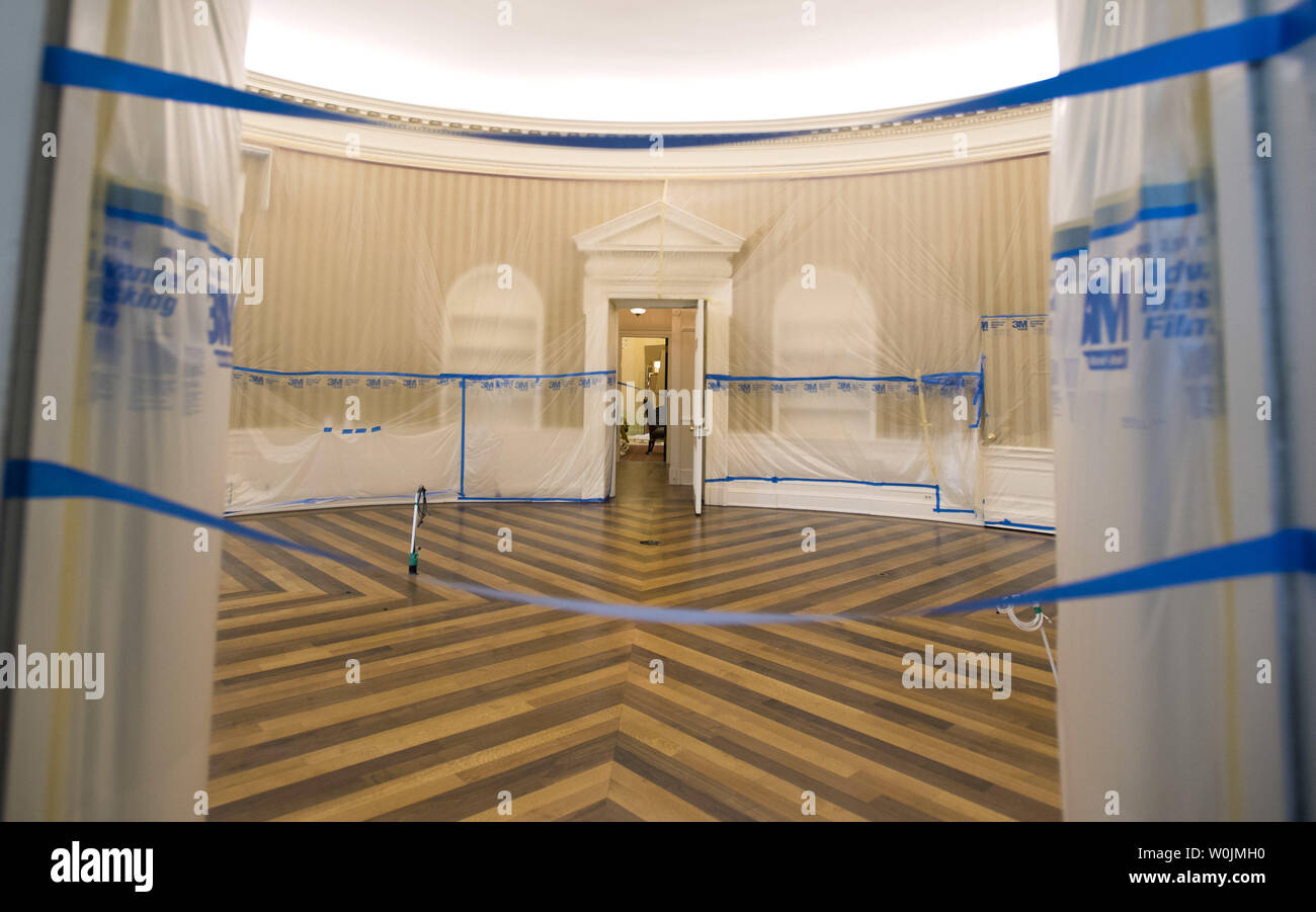 The Oval Office is seen emptied and covered in plastic as renovations are underway at the White House, in Washington, D.C. on August 11, 2017. While President Trump is in New Jersey on a 17-day vacation workers are updating and repairing the West Wing, including structural repairs, IT and HVAC improvements and generic cosmetic upgrades. Photo by Kevin Dietsch/UPI Stock Photo