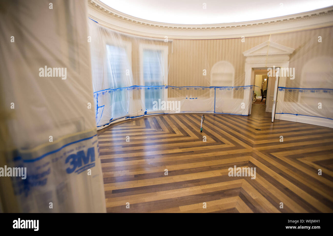 The Oval Office is seen emptied and covered in plastic as renovations are underway at the White House, in Washington, D.C. on August 11, 2017. While President Trump is in New Jersey on a 17-day vacation workers are updating and repairing the West Wing, including structural repairs, IT and HVAC improvements and generic cosmetic upgrades. Photo by Kevin Dietsch/UPI Stock Photo