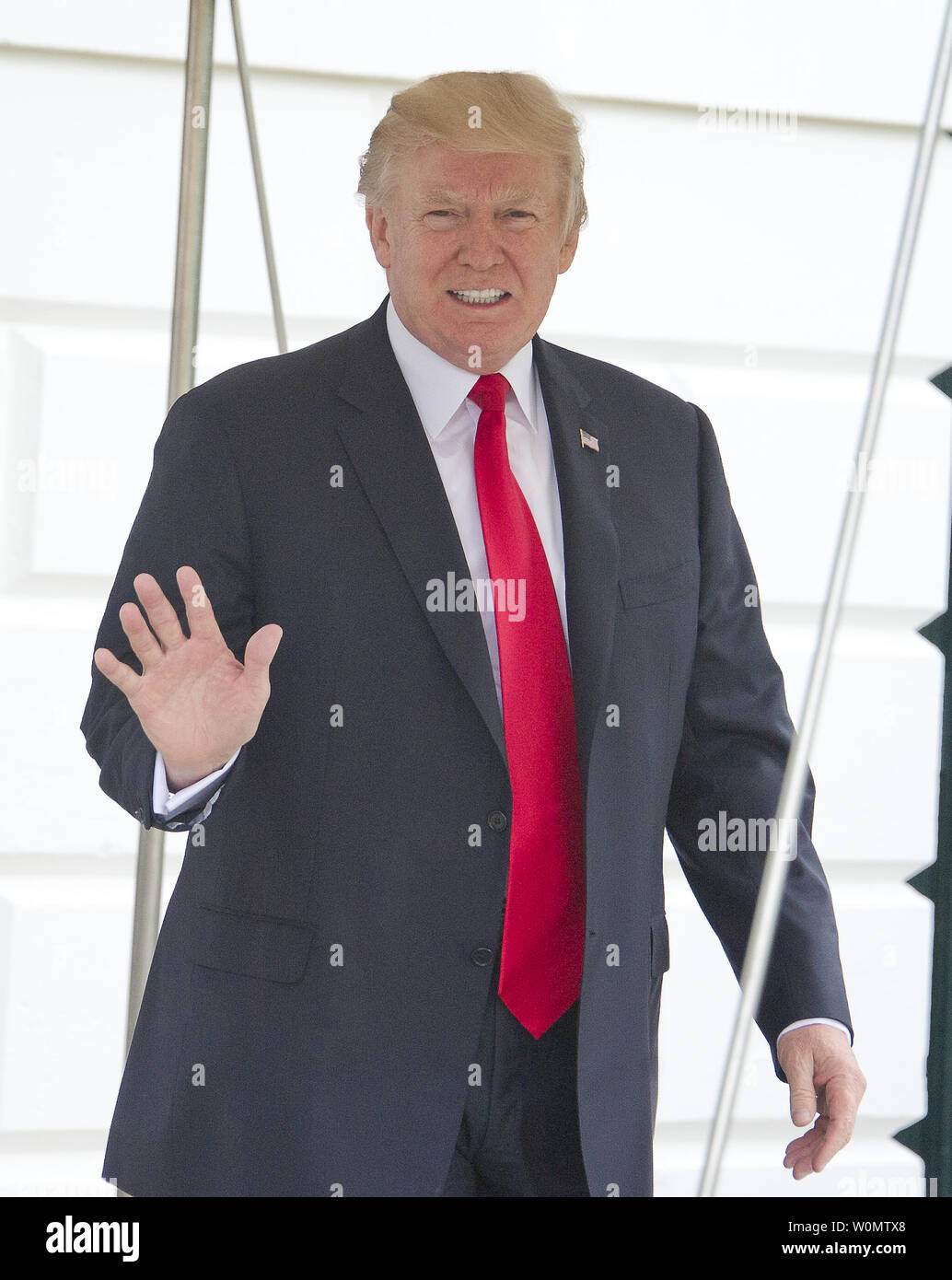 United States President Donald J. Trump departs the White House in Washington, DC to participate in the commissioning ceremony for the USS Gerald R. Ford (CVN-78), the latest US Navy supercarrier, on July 22, 2017.         Photo by Ron Sachs/UPI Stock Photo