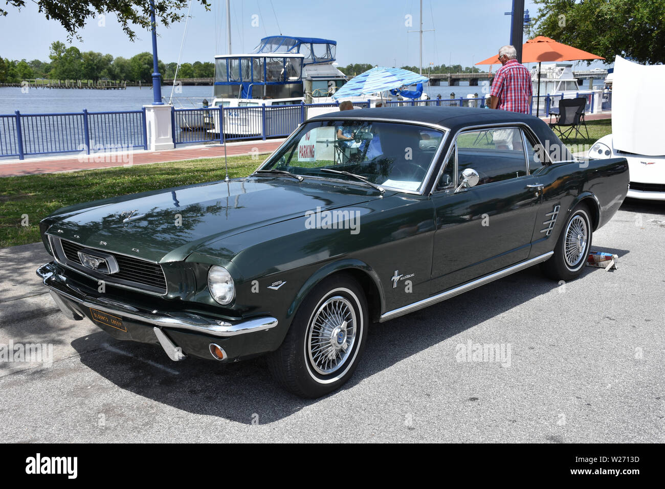 A 1966 Ford Mustang on display at a car show. Stock Photo