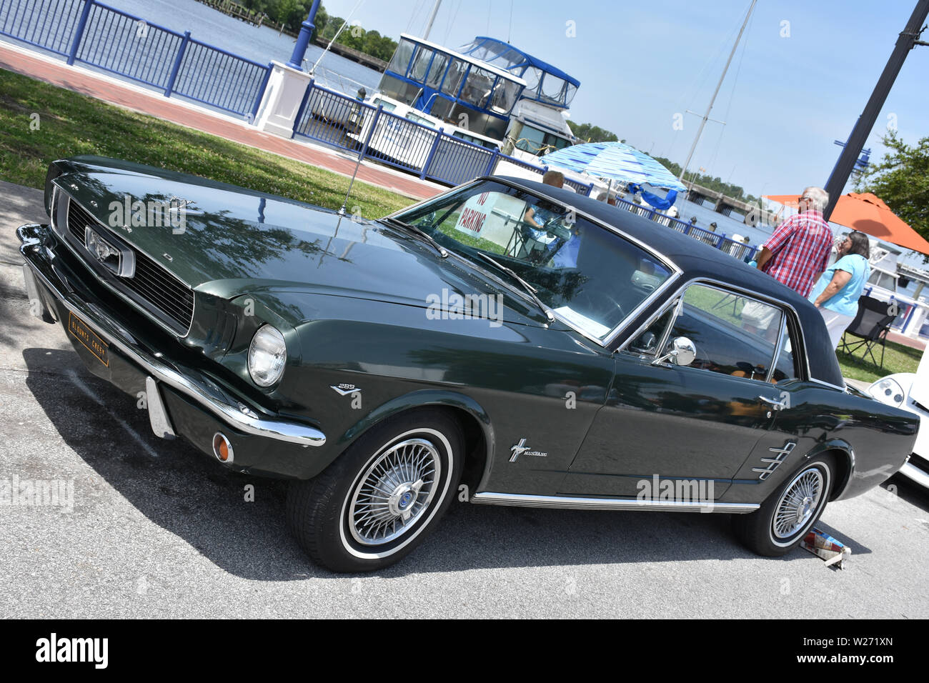 A 1966 Ford Mustang on display at a car show. Stock Photo