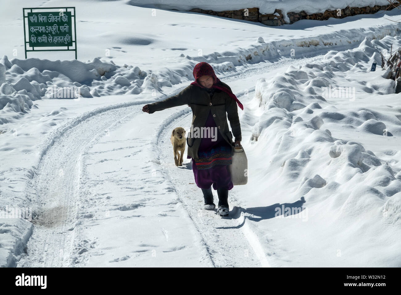 Winter drive to beautiful & lonely snow planet in Kibber village, Spiti Valley, Himachal Pradesh, India - Most beautiful place, Kibber village people Stock Photo