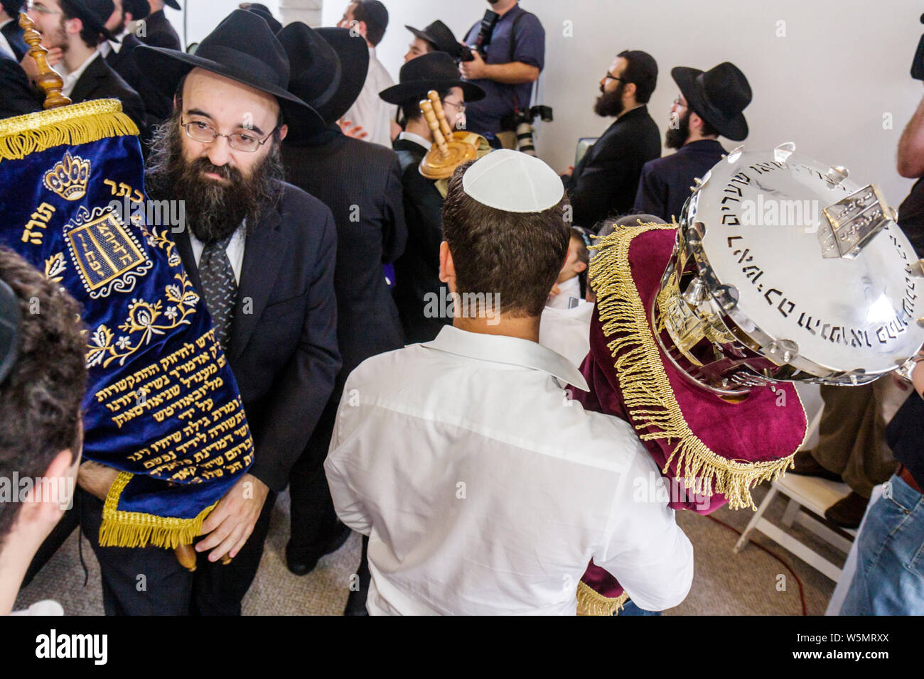 Miami Beach Florida,ceremony,completion,new Sefer Torah,rabbi,rebbe,Orthodox Jew,Chabad Lubavitch,Hasidic,religion,tradition,Judaism,man men male,Blac Stock Photo