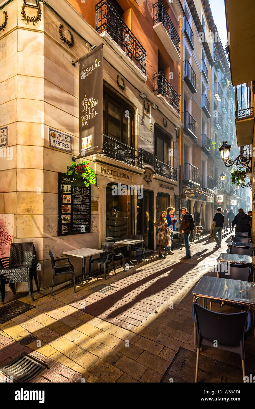 A street in Zaragoza old town know as El tubo district, very popular for nightlife and taps bar. Zaragoza, Aragon, Spain, December 2018 Stock Photo