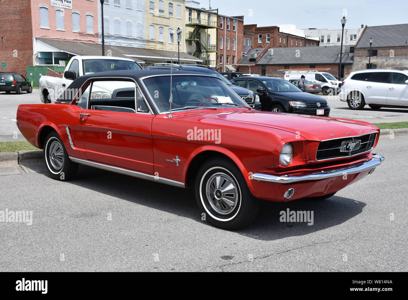 A 1965 Ford Mustang on display at a car show. Stock Photo