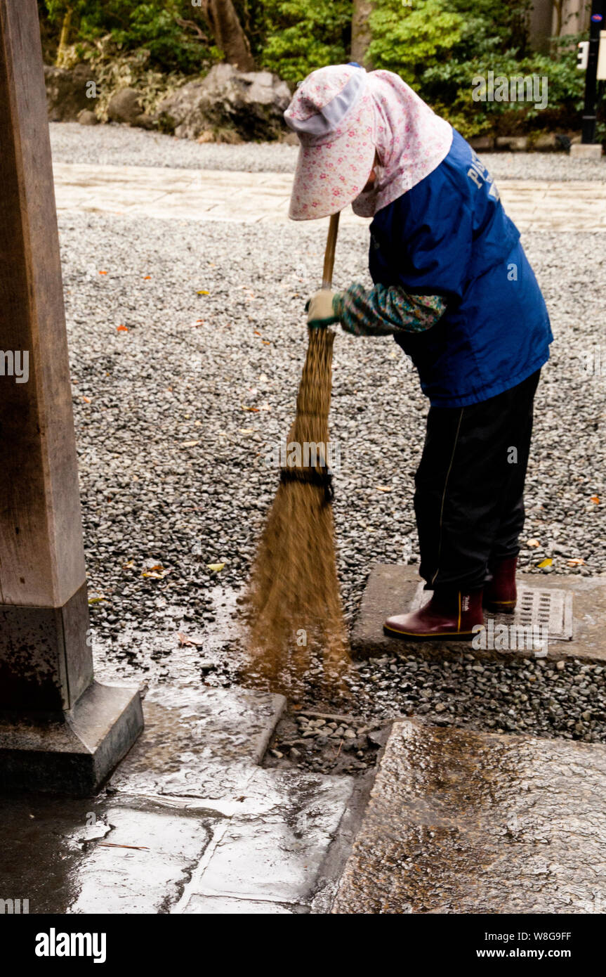 Kamakura, Japan with a Nanbuhouki, a broom with wavy tips. Stock Photo