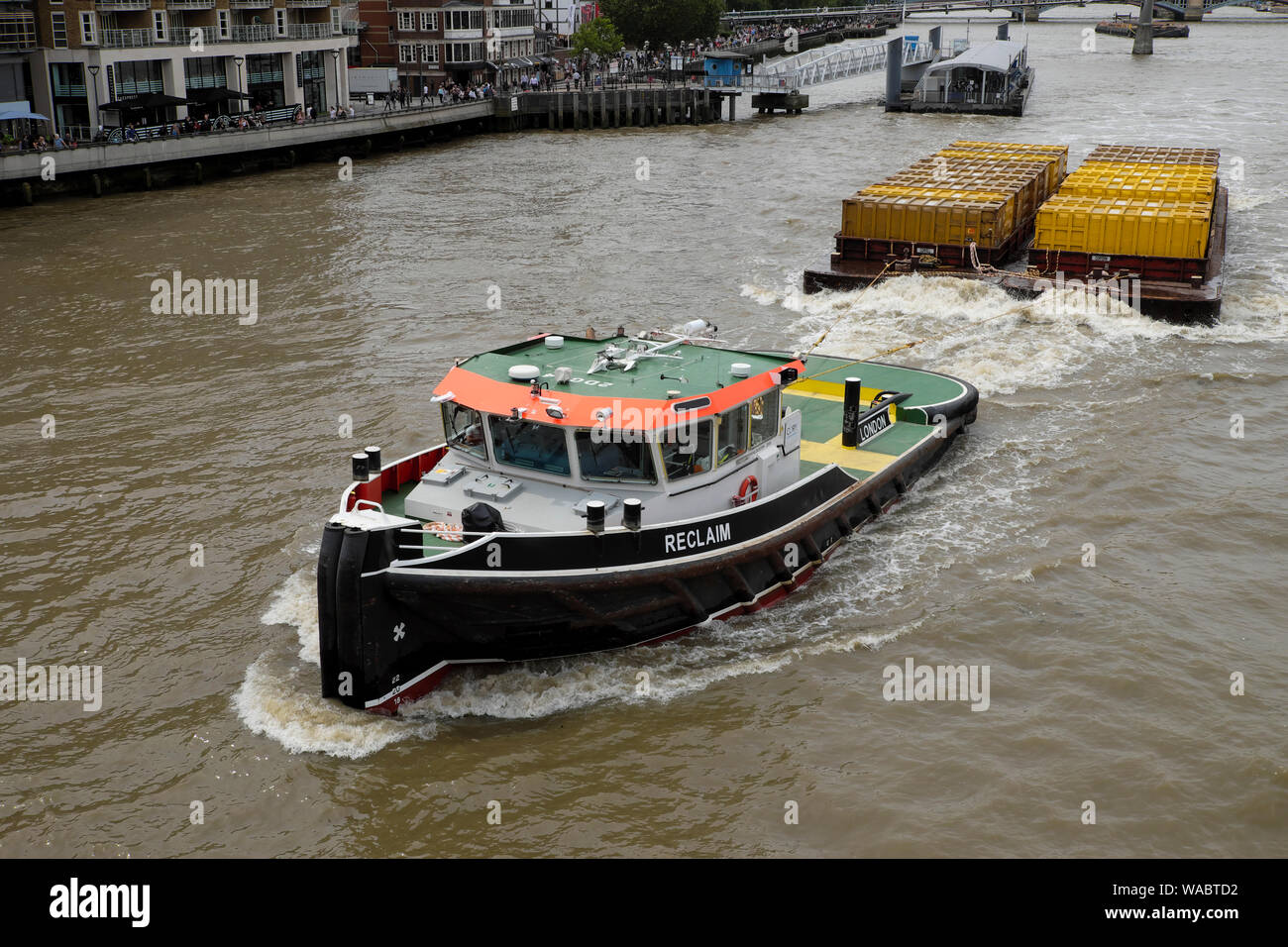 Cory tug boat on the River Thames towing cargo upstream in summer 2019 Central London England UK  KATHY DEWITT Stock Photo