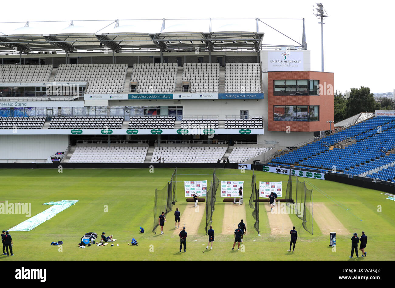 England's Joe Root, Joe Denly and Jason Roy bat in front of the new stand during the nets session at Headingley, Leeds. Stock Photo