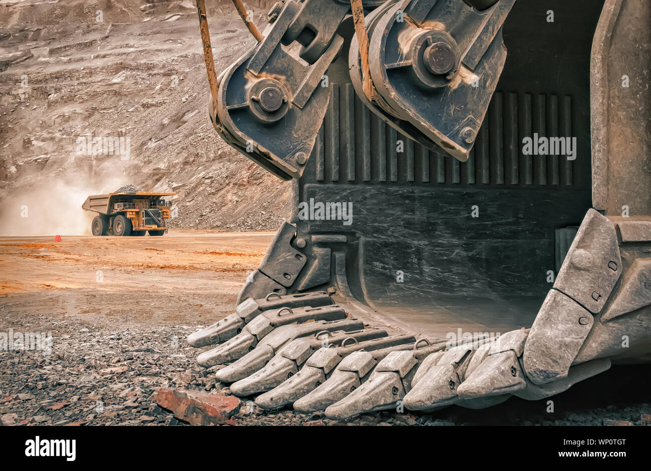 excavator scoop and mining truck in botswana in Jwaneng diamond mine Stock Photo