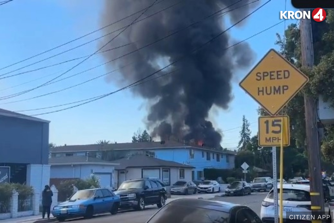 People are advised to avoid the area of a structure fire in Redwood City