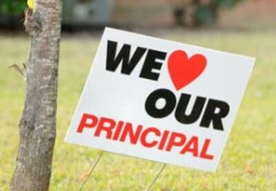 Yard Sign that says We Love Our Principals