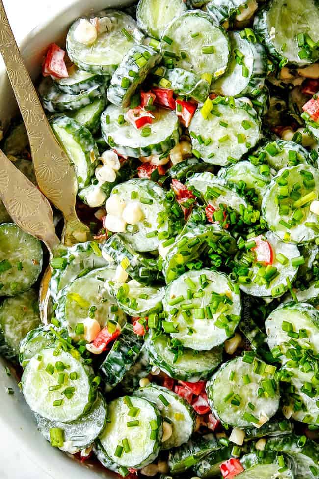 up close of cucumber dill salad with chives and creamy cucumber salad dressing