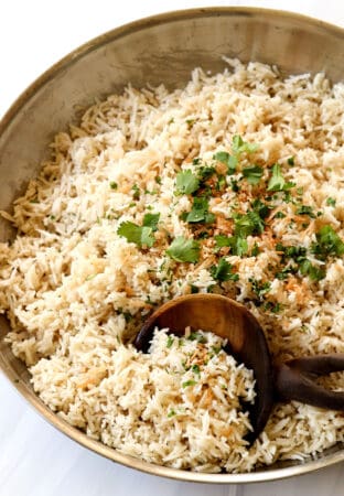 top view of coconut rice in a stainless steel skillet