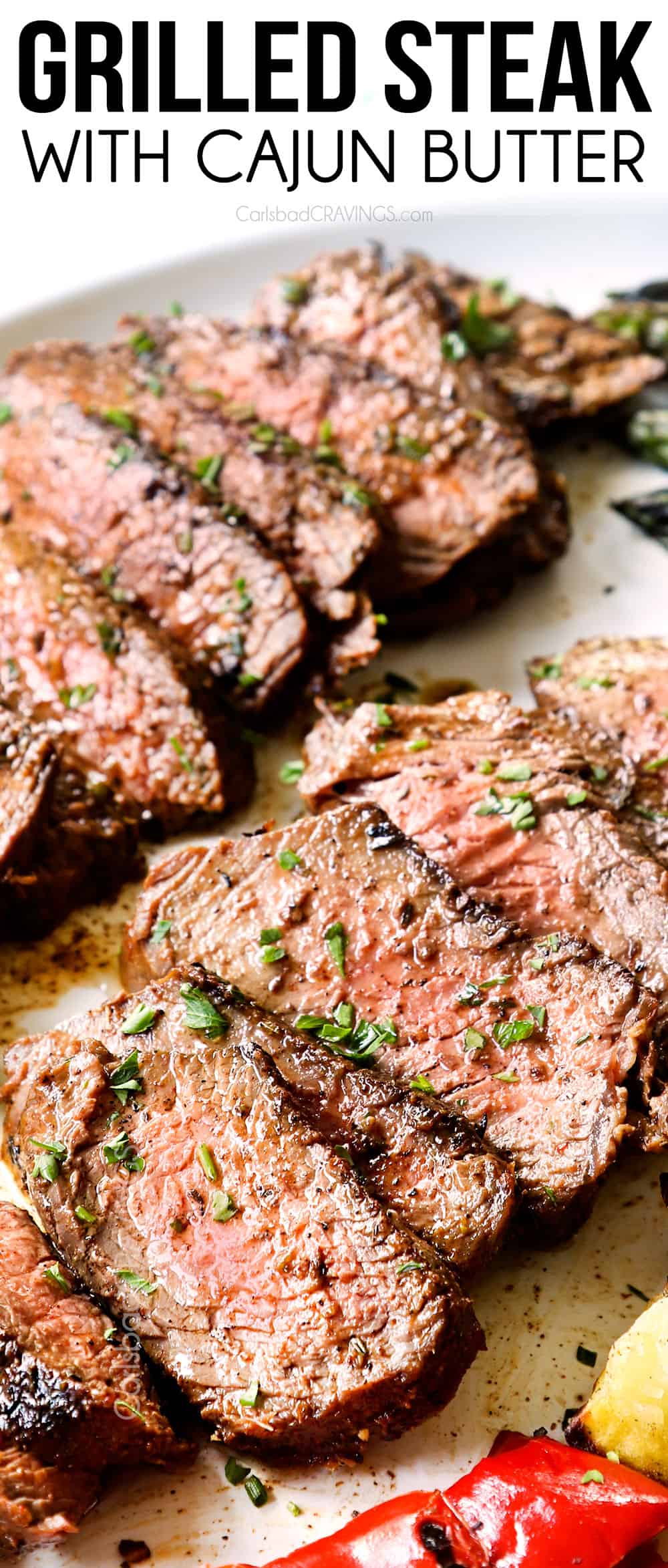 up close of sliced grilled steak lined on a platter showing what temp to cook it