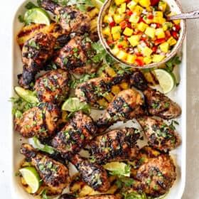 top view of Jamaican Jerk Chicken on a white platter